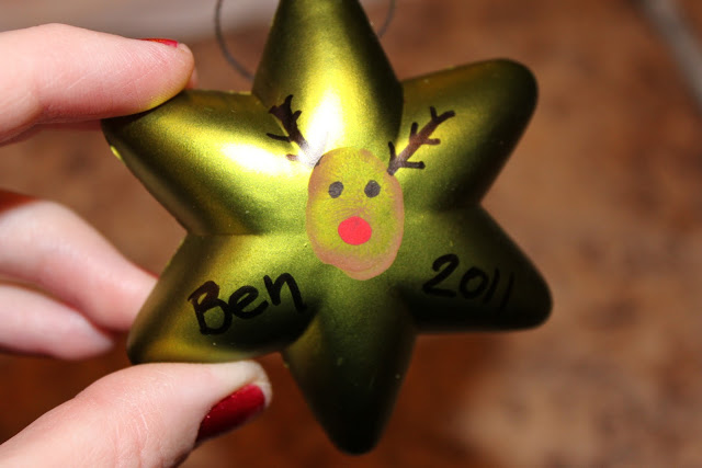 DIY Fingerprint Reindeer Ornaments--These ornaments are a great way to memorialize your little one's fingerprints