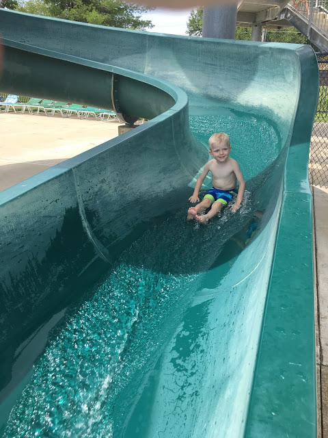 Little boy water slide 4th of July 