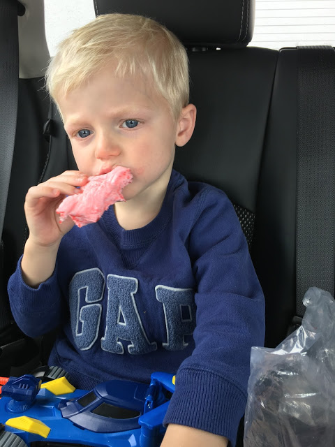 Boy eating cotton candy 