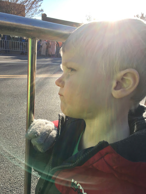 Weekending Little boy watching parade 