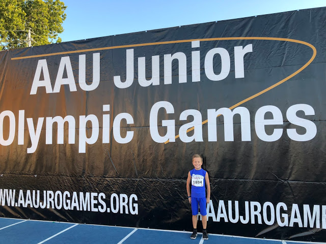 Boy competing in track at AAU Junior Olympics in Des Moines