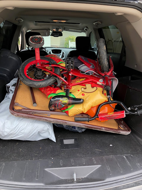 Weekend Recap Items loaded in back to SUV to be donated 