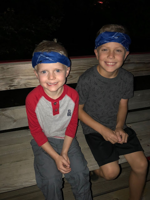 Weekend Recap brothers on a hayride at night 