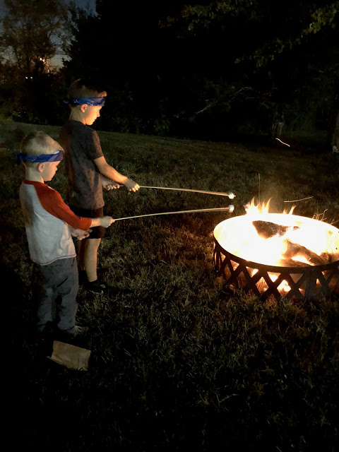 Brothers making S'mores