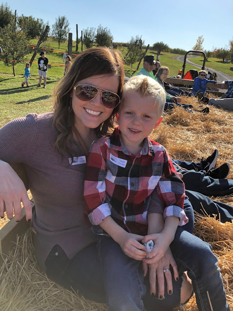 Mother and son on a hayride 