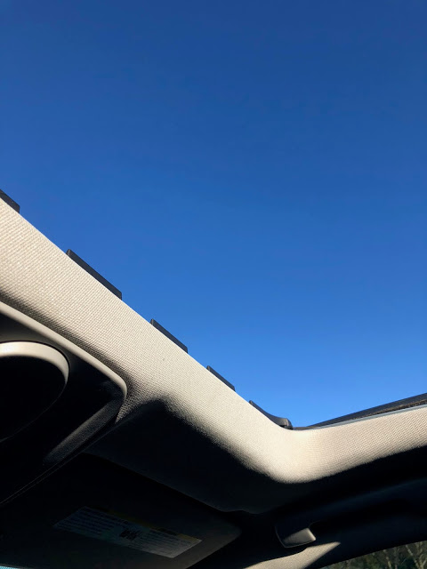 Blue Skies through a sunroof