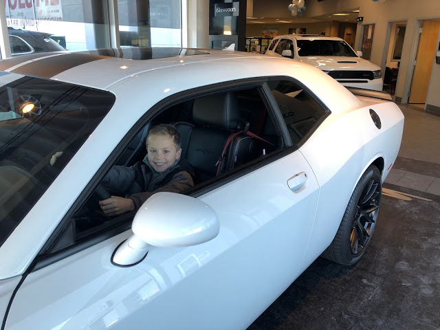 Young Boy driving sports car 