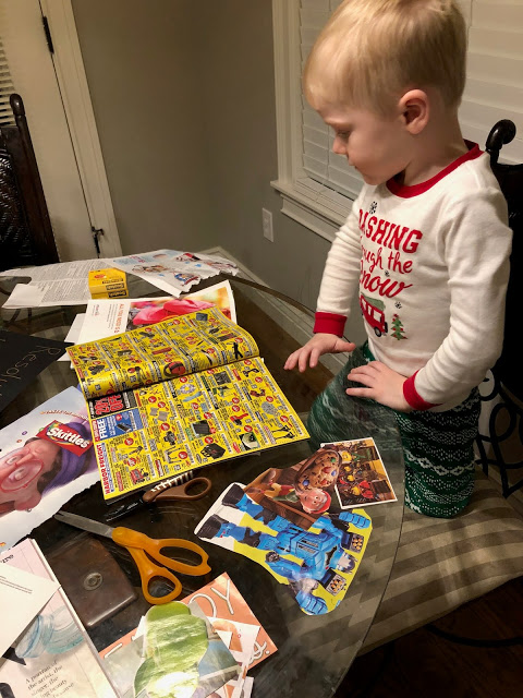 Young boy making a Vision Board Making 