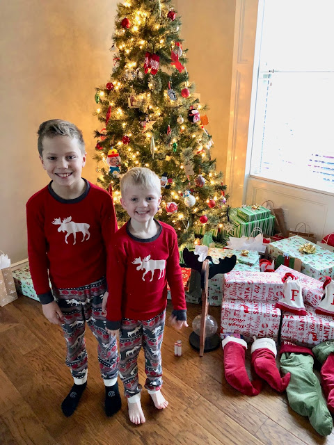 Young Boys on Christmas Morning in matching pajamas 